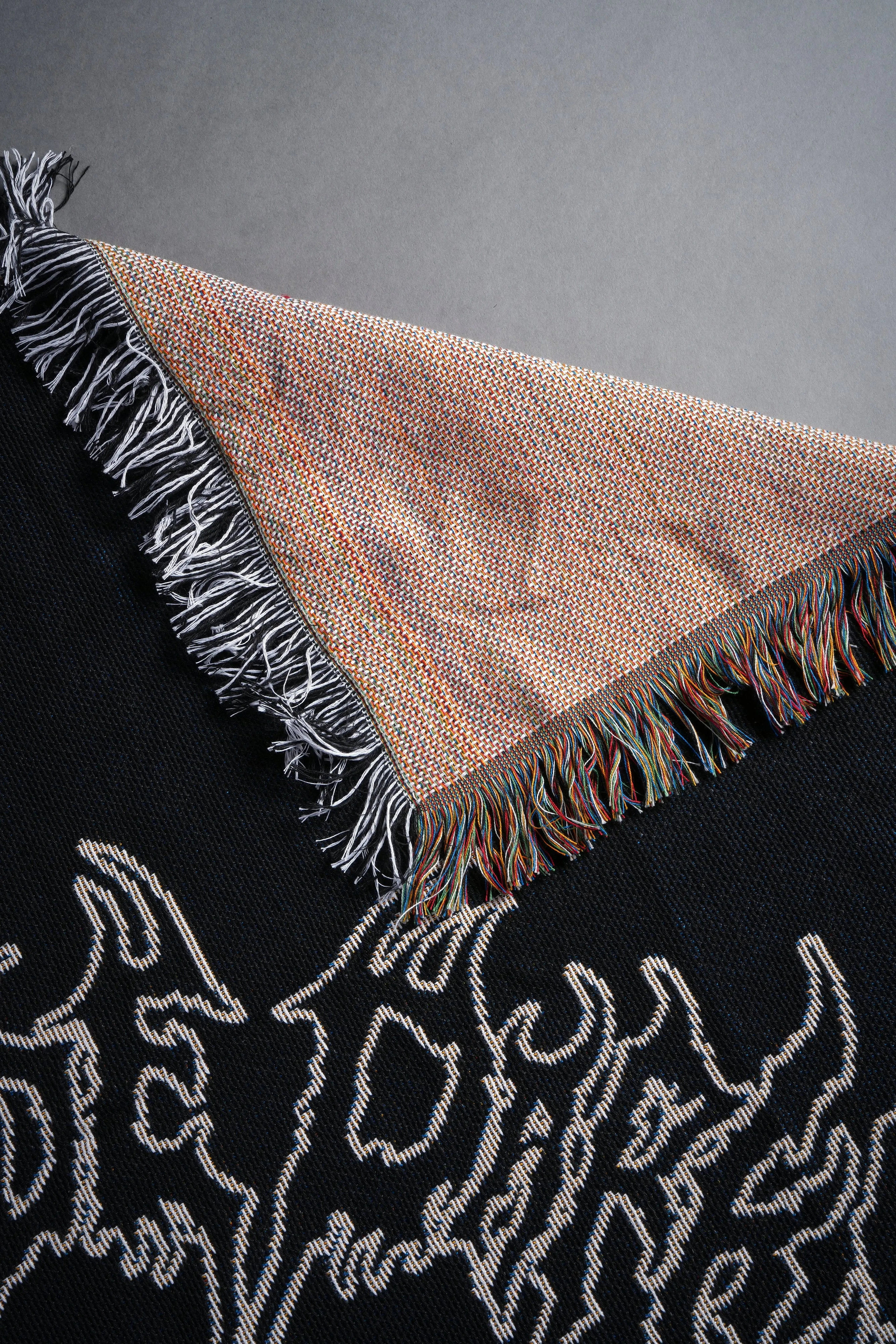 Rise To Darkness Tapestry Blanket in Black