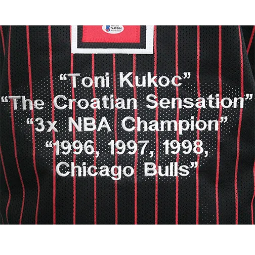 Toni Kukoc Autographed Basketball Jersey Black Pinstripe w/ STATS! (Beckett)